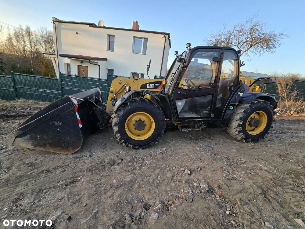 Caterpillar TH 337 AG  PREMIER 1WŁ SALONOWY - 9