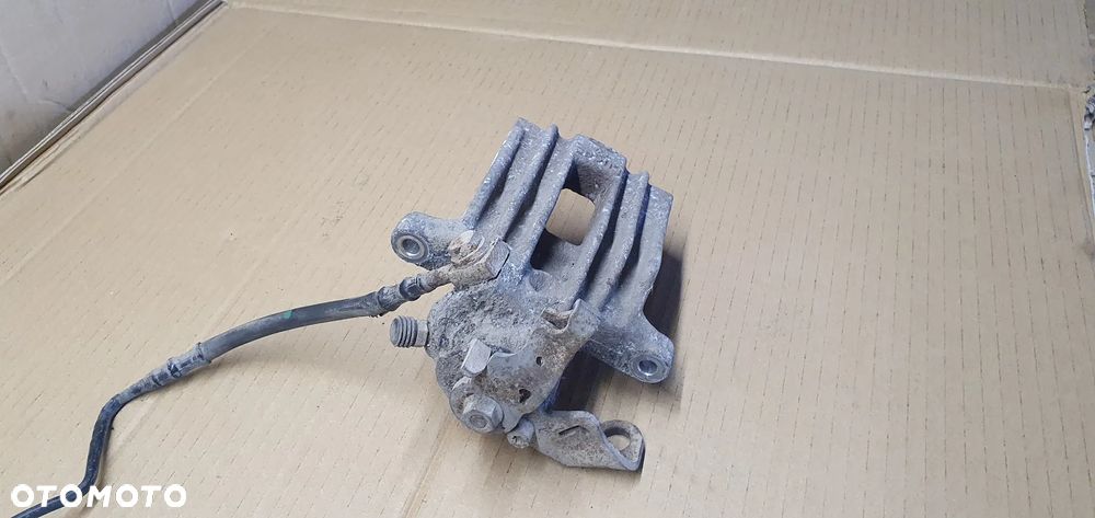 Zacisk hamulcowy prawy tył tylny prawy Seat Ibiza IV 6J - 3