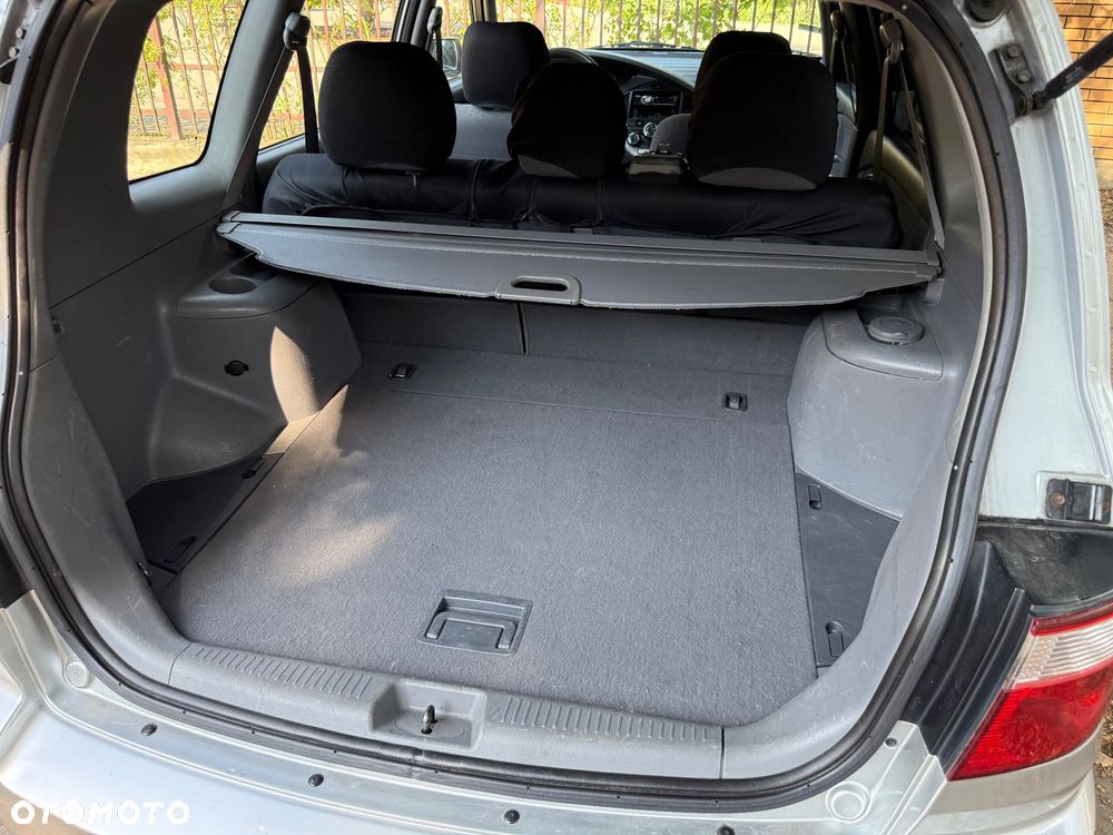 Kia Carens 1.6 / Tour - 13
