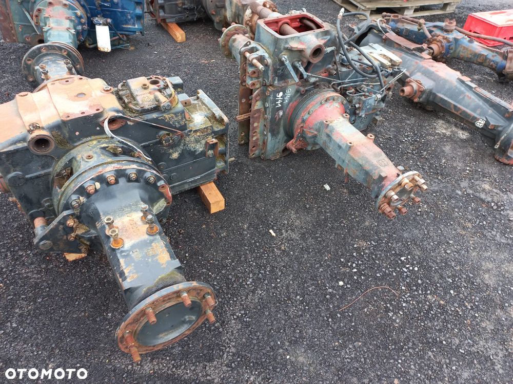 Most obudowa mostu przód tył ,zwolnica,zwrotnica,układ planetarny,atak,koło ataku wałek,półoś explorer,titan,antares,same,lamborghini,hurlimann,deutz,agroplus,agrosun,agrotron,silver,formuła,master,racing,premium,r774,0.467.473.0 ,01127250/20 ,445.4410.0 ,2324411 ,202.3111.0 ,25544100 ,91071140 ,9107.110.0, 269.4330.0 ,275.4356.0 ,255.3110.0 ,270.4741.0 ,.91311100 . 0.008.3208.0 , 0.008.3210.3,269.4331.0, 27244100. - 1