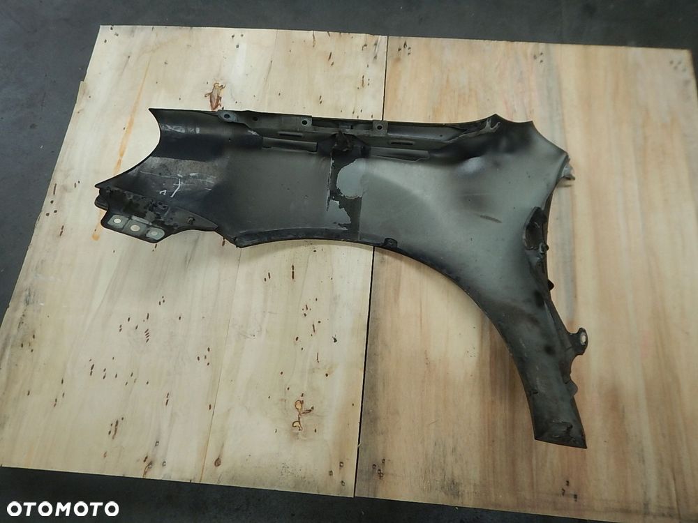 blotnik przod prawy vw golf v - 13