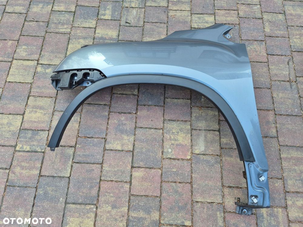 blotnik lewy przod chevrolet trax - 1