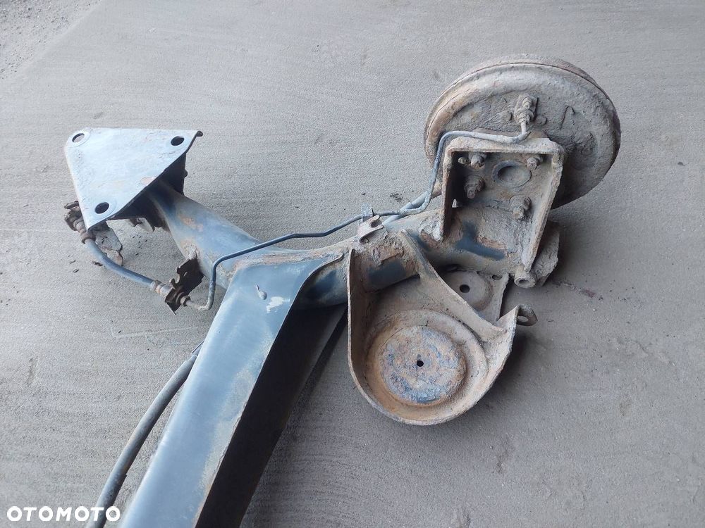 BELKA OŚ ZAWIESZENIA TYŁ BĘBNY BEZ ABS FIAT PANDA II - 2