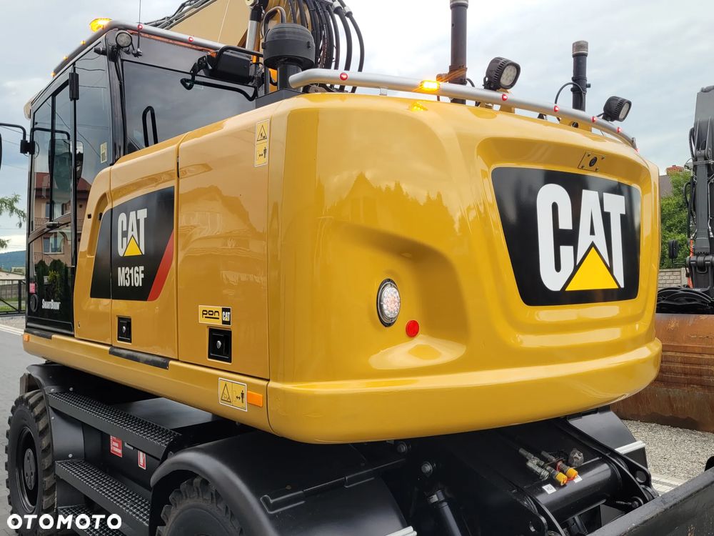 Caterpillar M316F / ROTOTILT ze szczypcami / sprowadzona / - 11