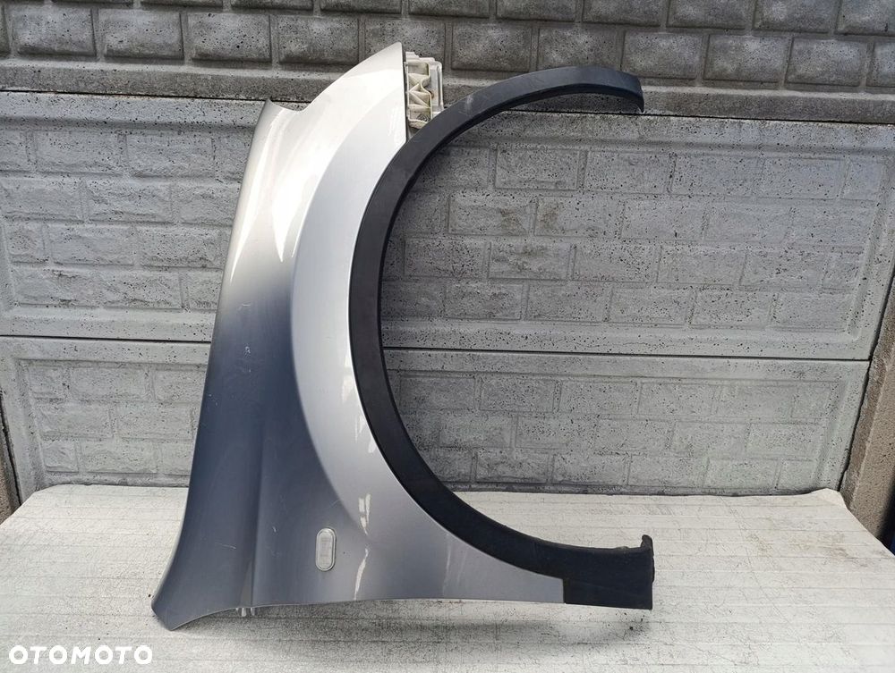 NISSAN QASHQAI 6-10 BŁOTNIK PRAWY PRZÓD ORYGINAŁ