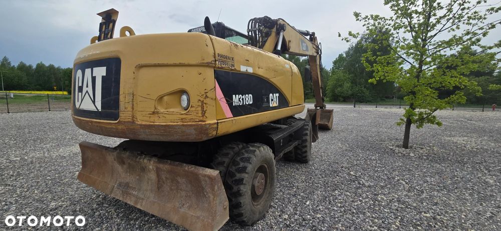 Caterpillar M318D - 5