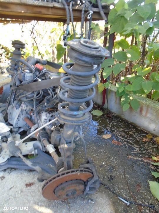 Arc + telescop stanga Renault Kangoo 1.4 benzina din 2009 - 1