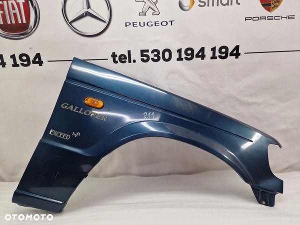 HYUNDAI GALLOPER PRAWY BŁOTNIK PRZEDNI PRZÓD W OPCJI BEZ LISTWY , NR AUKCJI BŁ211