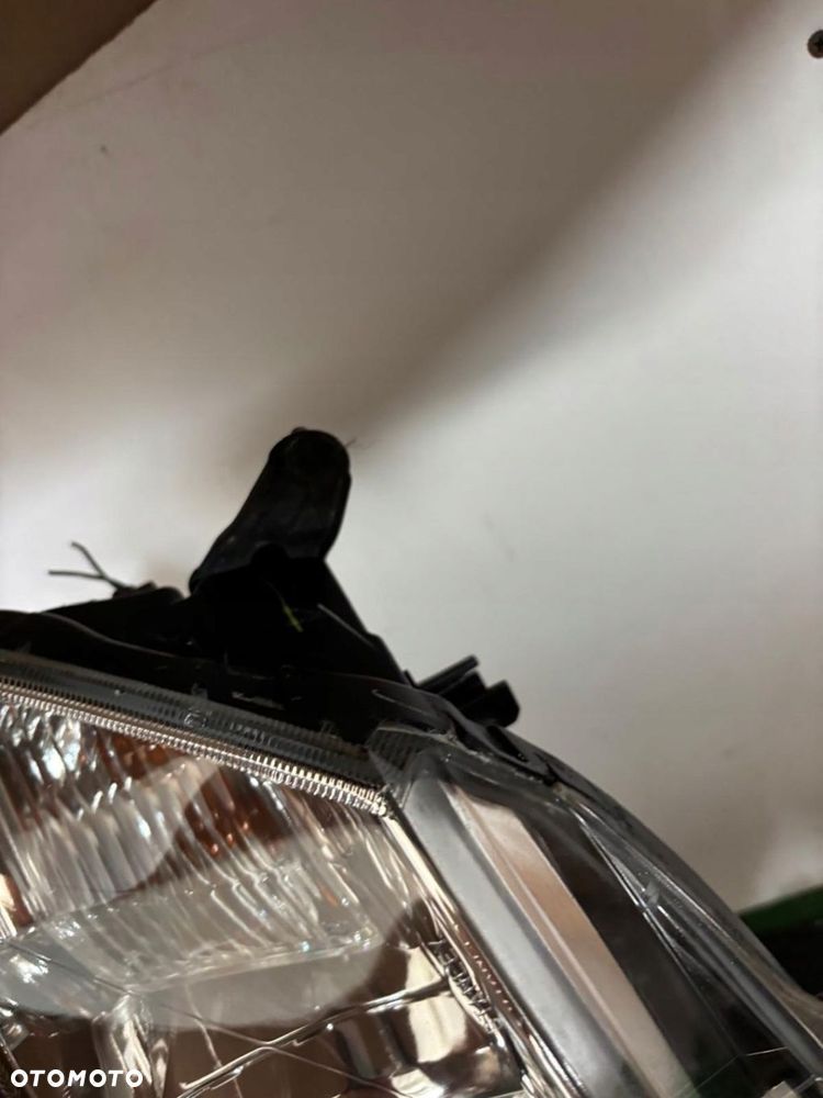 LAMPA LEWA REFLERTOR MITSUBISHI PAJERO SPORT L200 HALOGENOWA DEMONTAŻ EU - 8