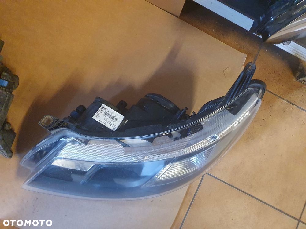 REFLEKTOR L/P SAAB 9-3 93 ZWYKŁY SOCZEWKA - 9