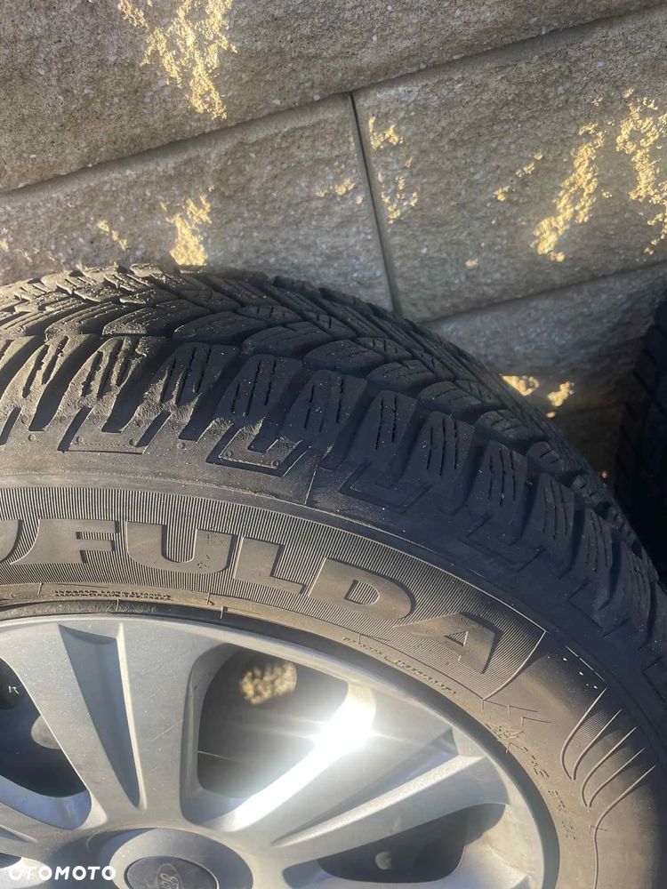 Koła zimowe z kołpakami FORD MONDEO 215/60 R16 5x108 - 5