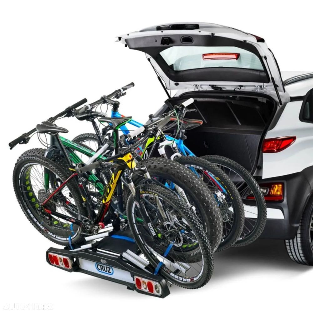 Suport biciclete Cruz Pivot R3 940-516 cu prindere pe carligul de remorcare, pentru 4 biciclete, 13 pini, NOU- Pret importator, emitem Factura & Garantie - 3