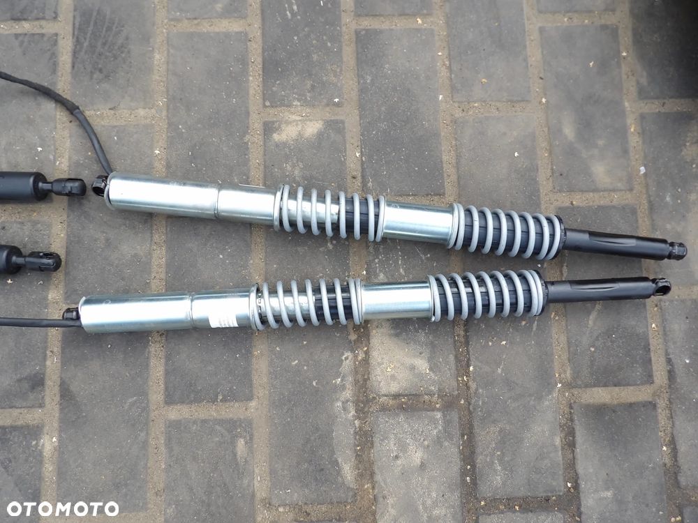 BMW - F11 - SIŁOWNIK KLAPY BAGAŻNIKA - ELEKTRYCZNY - PRAWY/LEWY - CENA ZA KOMPLET - 7207015 - 1