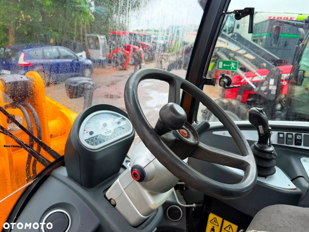 JCB 409 - 25