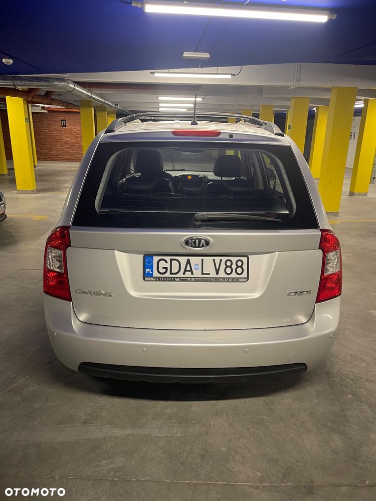 Kia Carens - 4