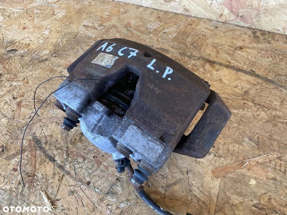 ZACISK HAMULCOWY PRZÓD LEWY AUDI A6 A7 4G 4G0105AK - 7