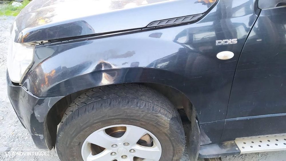 GUARDA-LAMAS FRENTE ESQUERDO SUZUKI GRAND VITARA JBJT - 1