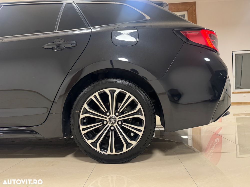 Toyota Corolla 1.8 HSD Exclusive - 32