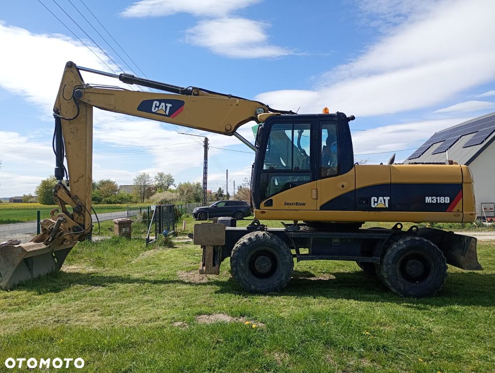 Caterpillar M318D - 4