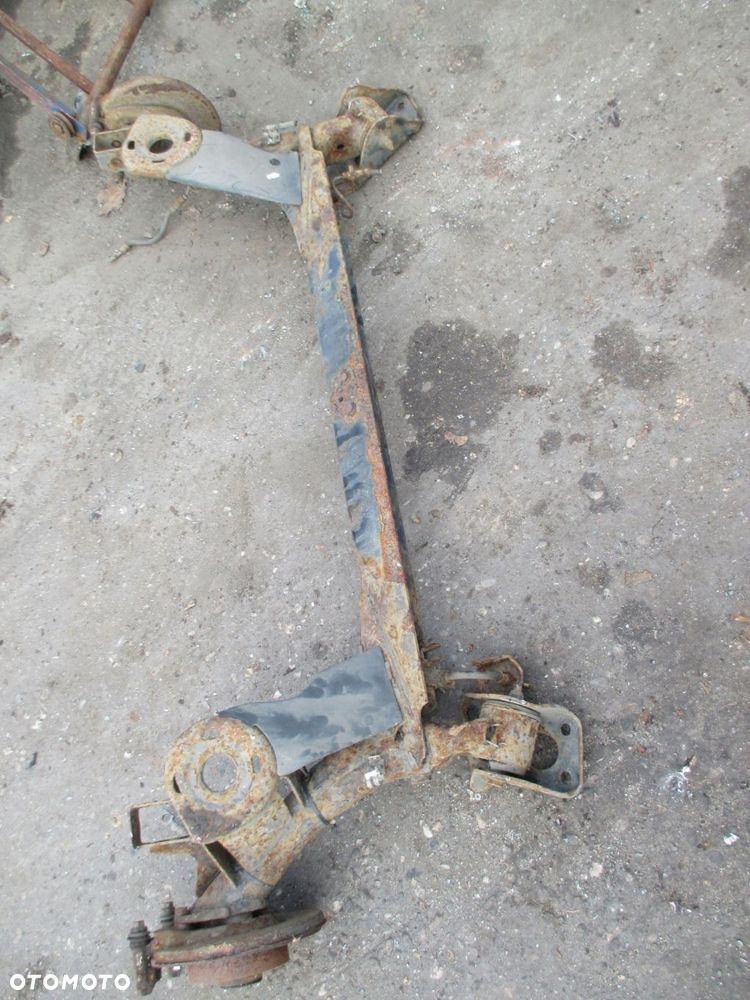 OŚ TYŁ BELKA ZAWIESZENIA AUDI A3 8L GOLF IV LEON I - 4