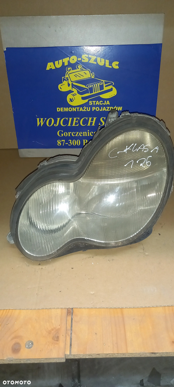 Lampa przód przednia lewa Mercedes W203 A2038200261