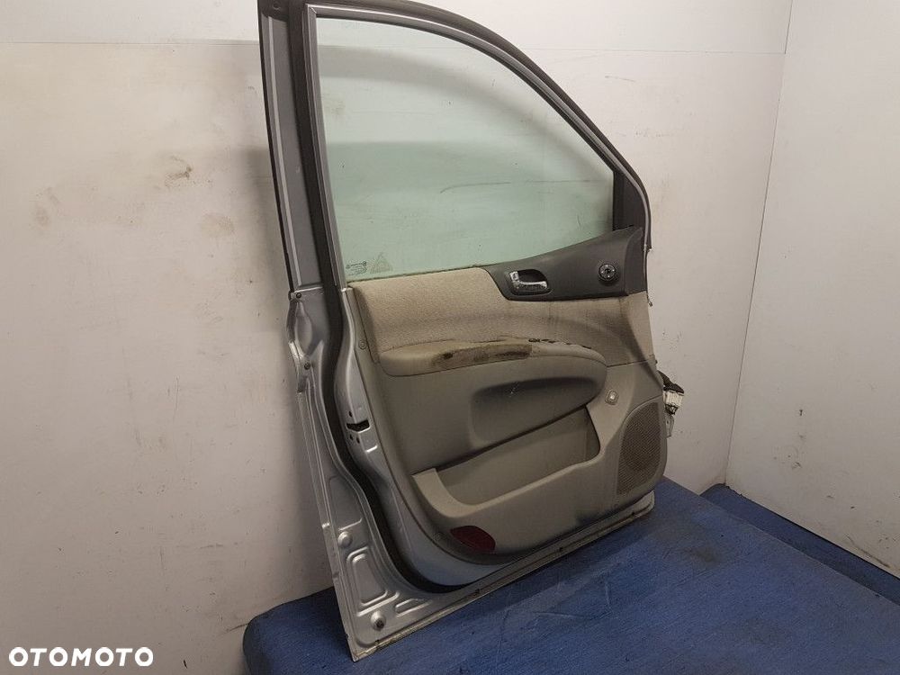 KIA CARNIVAL II DRZWI PRZÓD LEWE - 12