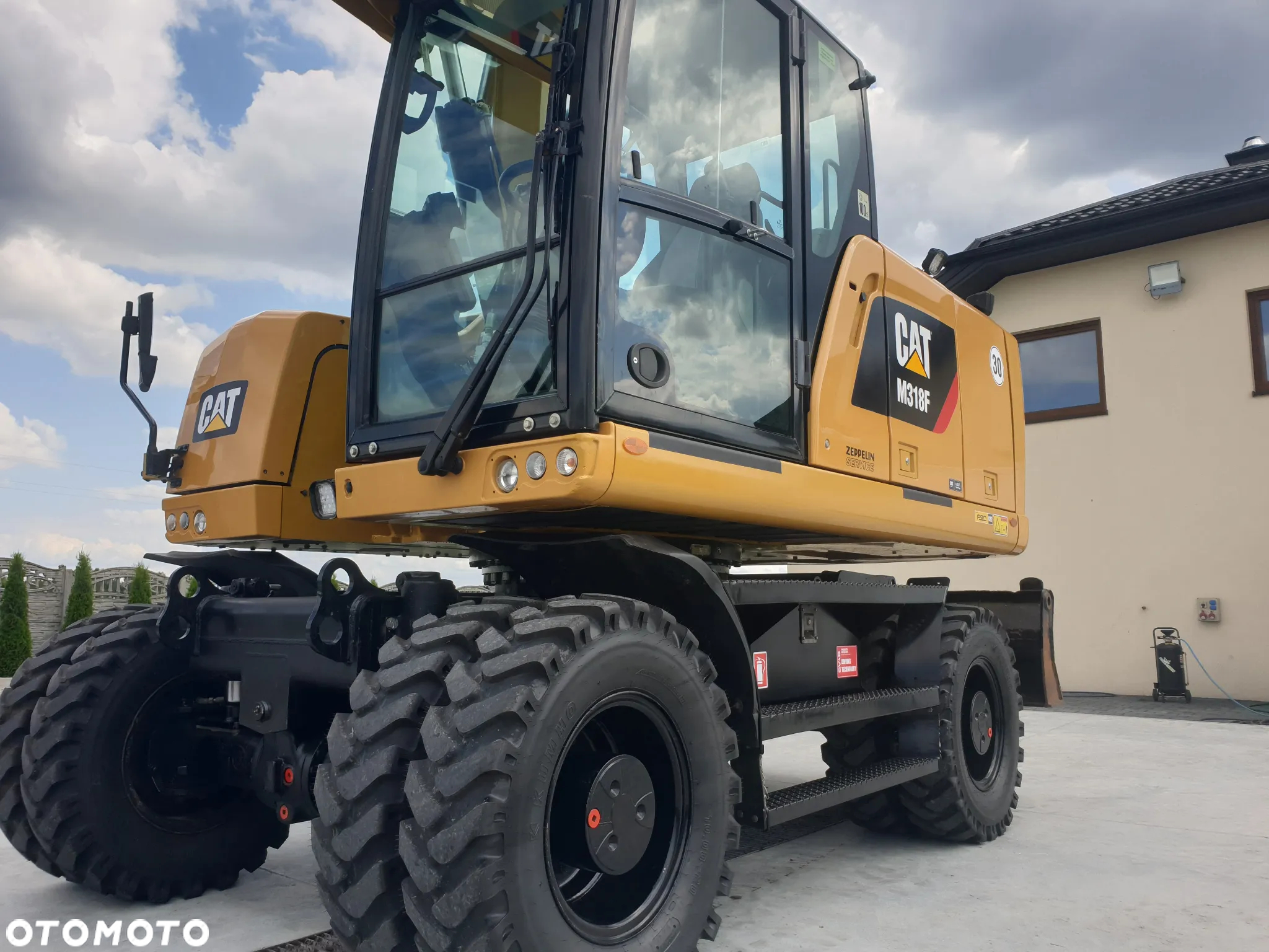 Caterpillar M 318 F ROTOTILT SPROWADZONY ŁADNY STAN - 32