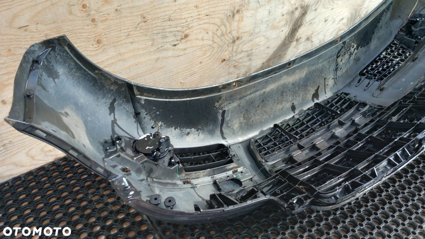 AUDI A6 C6  ZDERZAK PRZÓD  HALOGEN - 12