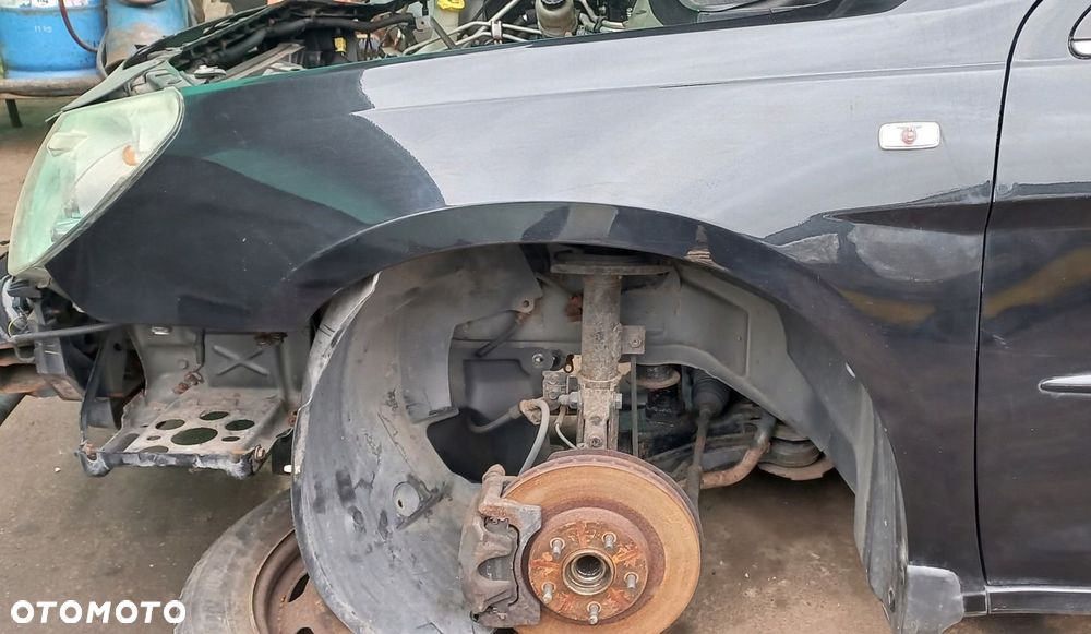 BŁOTNIK PRZEDNI LEWY CHRYSLER SEBRING III 06-10 SEDAN