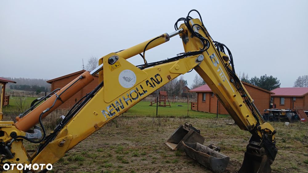 New Holland LB 115 - 11