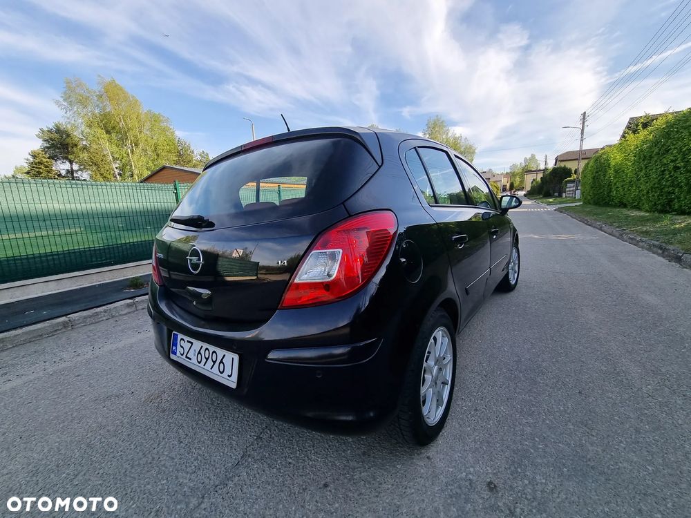 Opel Corsa 1.4 16V Cosmo - 7