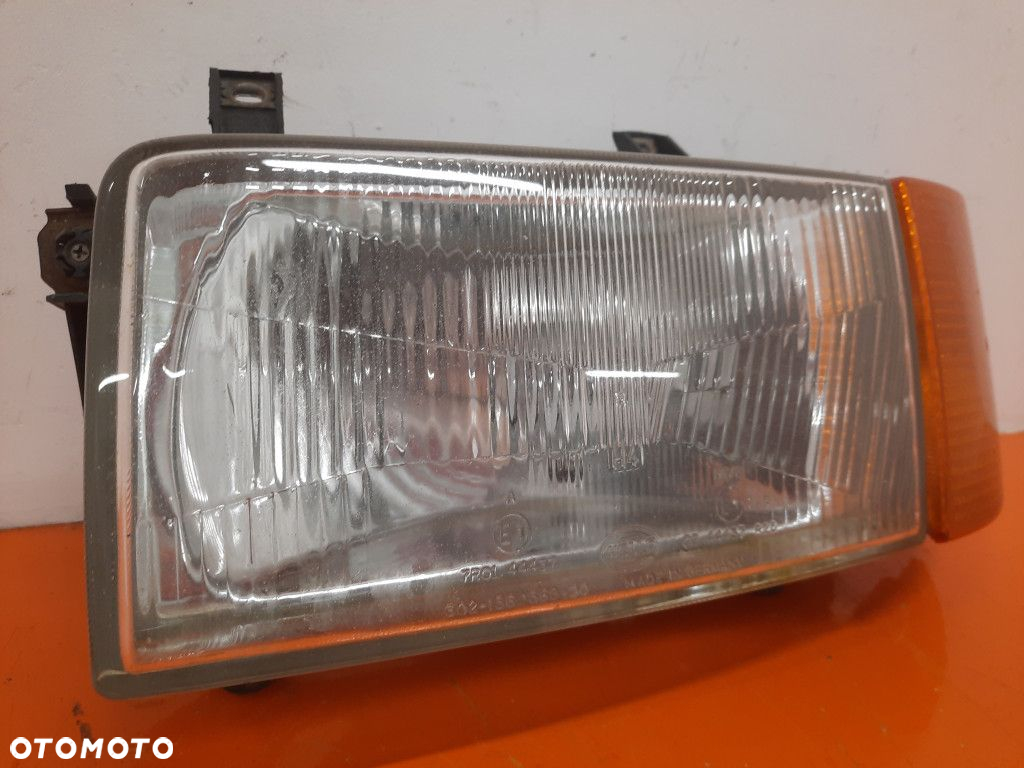 VOLKSWAGEN TRANSPORTER 2.5 T4 90-03 REFLEKTOR LEWY PRZÓD 0244437R20 - 2
