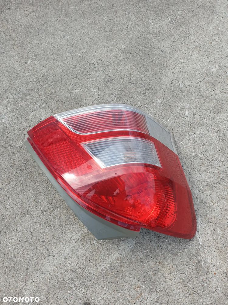 Lampa Lewa Tylna Toyota Yaris II Lift demontaż oryginał - 4