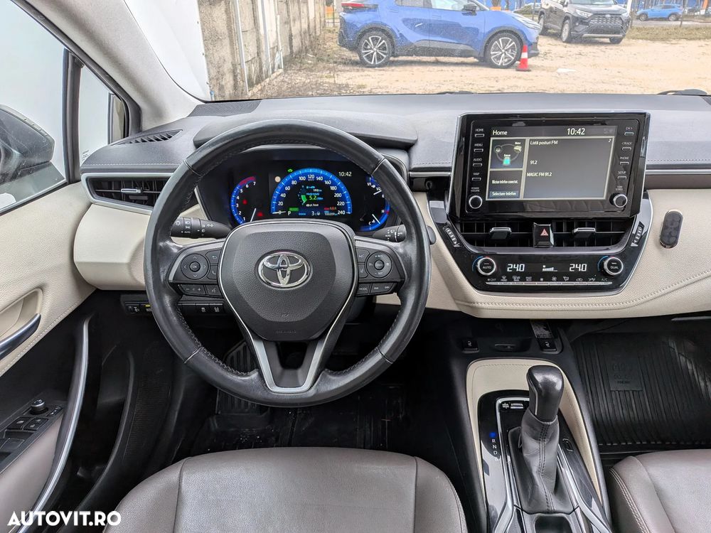 Toyota Corolla 1.8 HSD Exclusive Plus tapiterie Gri - 15