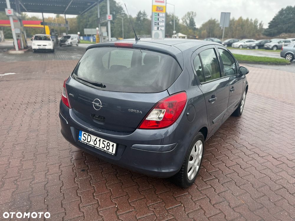 Opel Corsa 1.2 16V Cosmo - 7