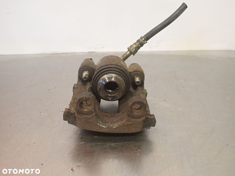 ZACISK HAMULCA PRAWY TYŁ BMW E36 - 6