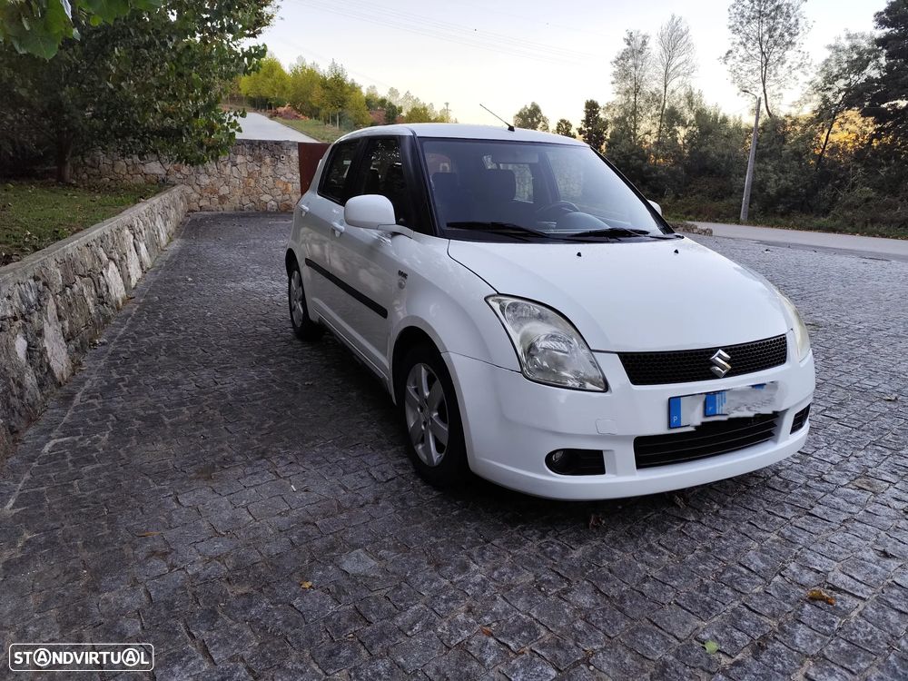 Suzuki Swift 1.3 DDiS Quiksilver - 2