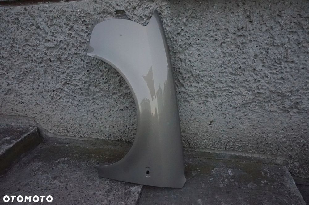 BŁOTNIK PRZEDNI LEWY AUDI A6 C5 LY1T 97/01r - 2