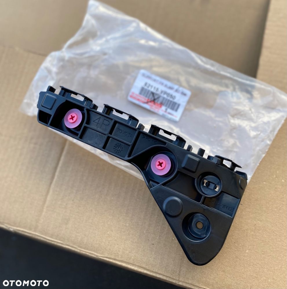 HONDA HILUX 8 VIII Lift NOWY ! ORYGINALNY ! PRAWY ŚLIZG WSPORNIK MOCOWANIE ZDERZAKA BŁOTNIKA  PRZEDNIEGO PRAWY PRZEDNI PRZÓD W zderzak 52115-YP050  52115YP050 - 1