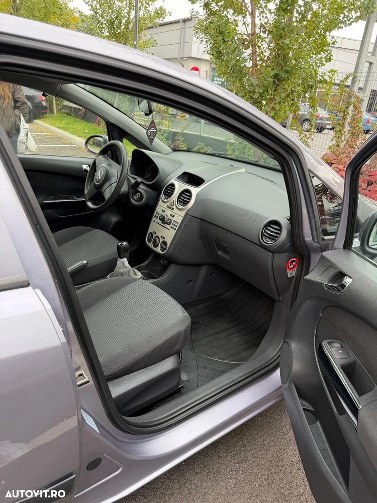 Opel Corsa 1.2i Cosmo - 7