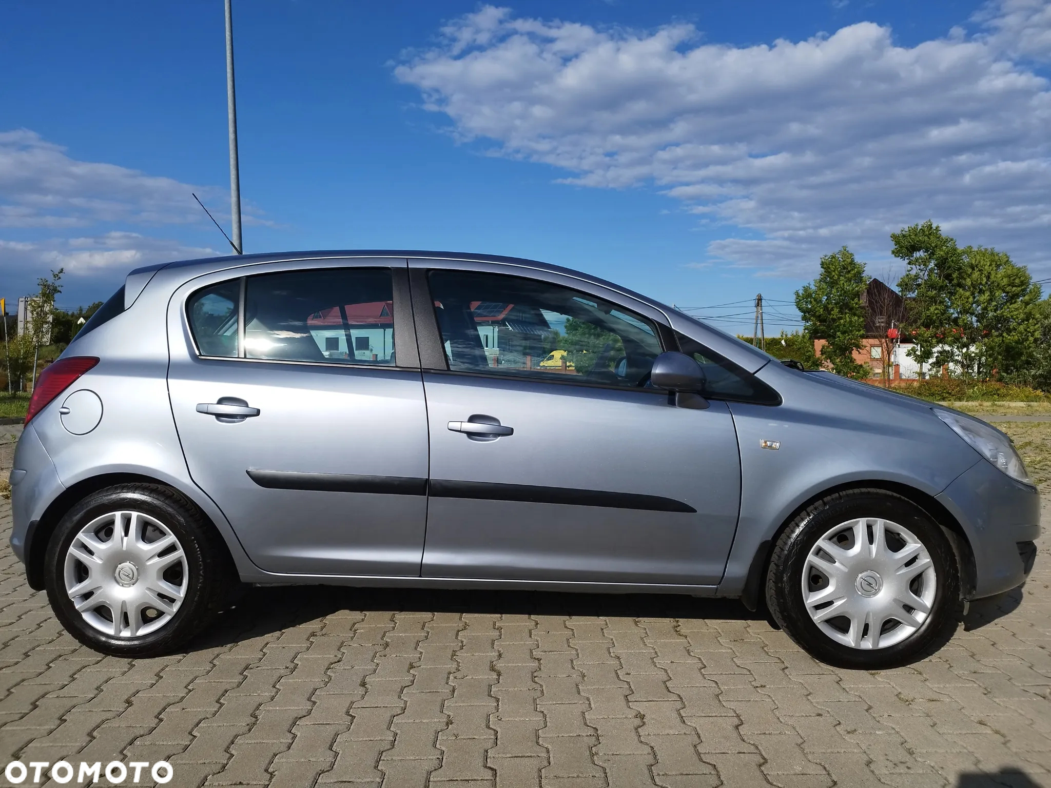 Opel Corsa 1.2 16V Cosmo - 5