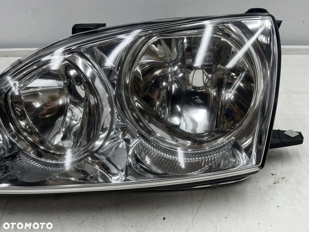 Lampa reflektor Toyota Avensis I T22 Lift 00-03r. NOWA lewa oryginał Europa jasna lewy przód 92101a2 - 5