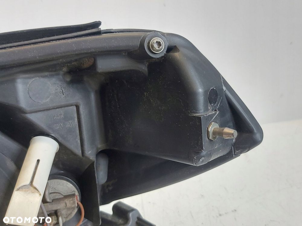 NISSAN PRIMERA P12 01- LAMPA PRAWA PRZÓD HELLA EUR - 11