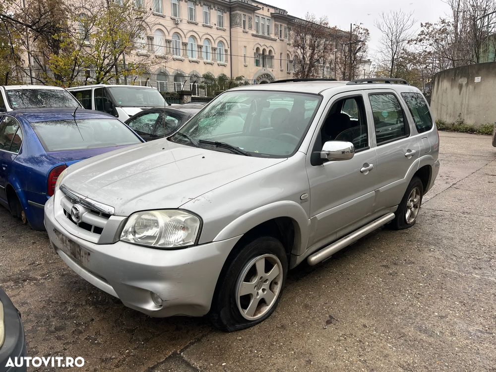 Dezmembrez Mazda Tribute 2002 gri argintiu benzina - 2
