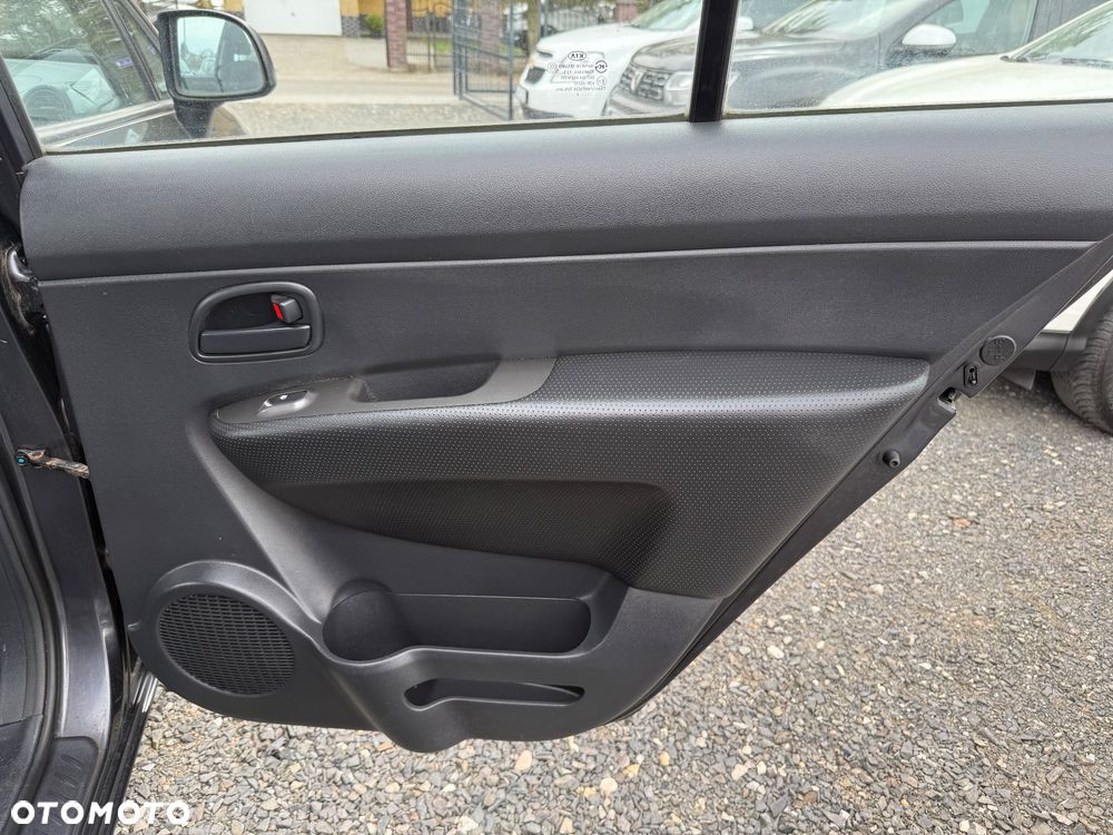 Kia Carens 2.0 CVVT EX - 14