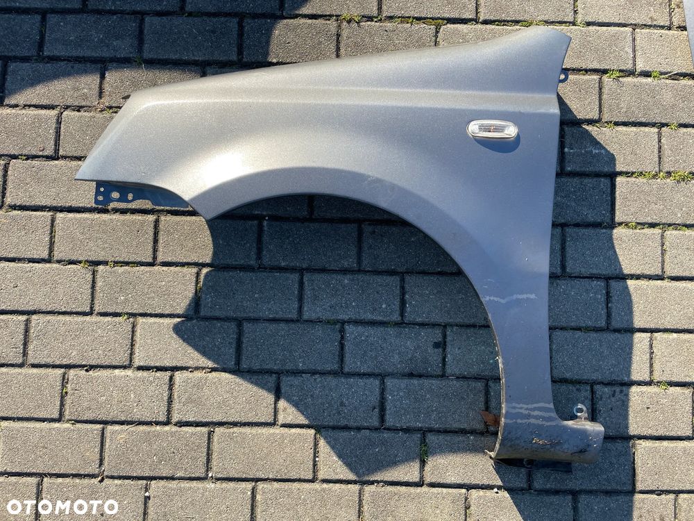 FIAT PANDA II LIFT BŁOTNIK LEWY PRAWY MASKA lampa zderzak lewa lewy przód pas przedni 695 - 3