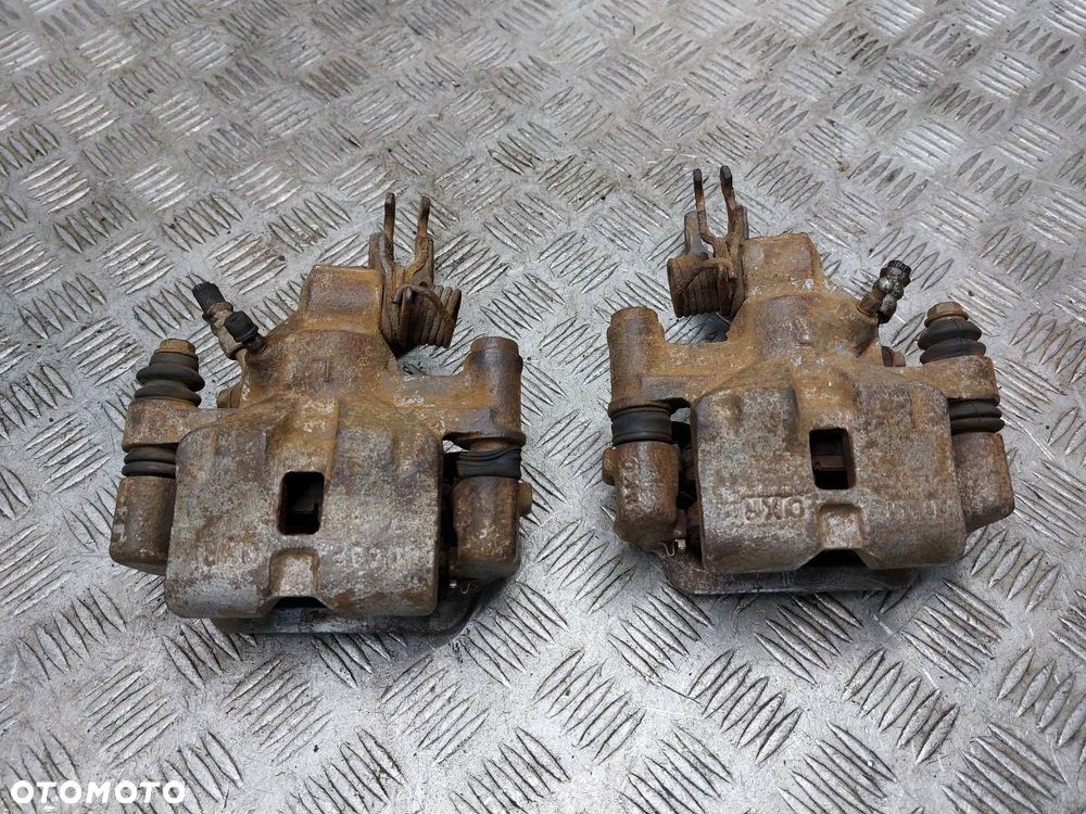 TARCZE HAMULCOWE TYŁ + KLOCKI + ZACISKI MAZDA 323F BJ 2.0 TD - 7