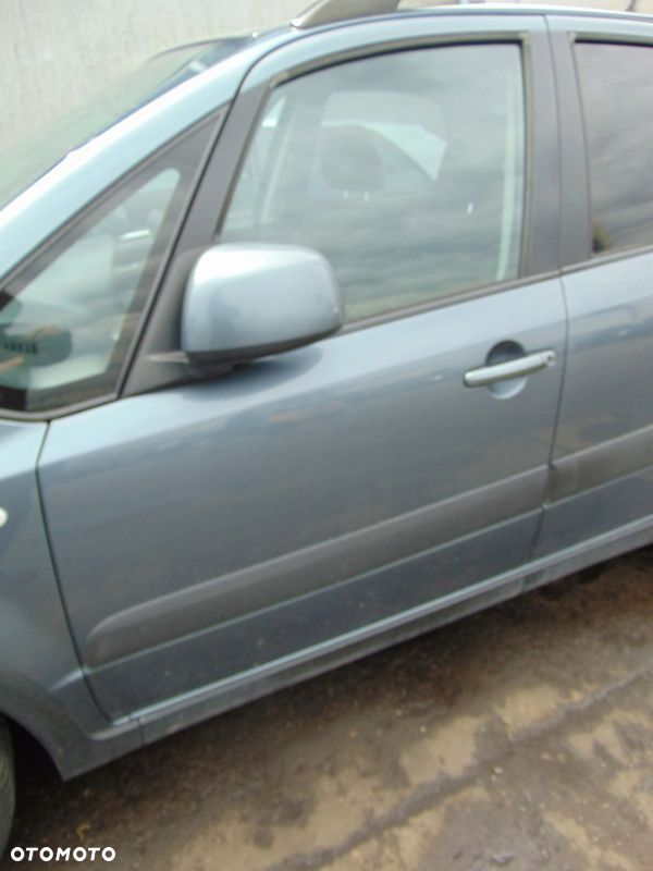 DRZWI LEWE PRZÓD PRZEDNIE SUZUKI SX4 FIAT SEDICI ZY4 Z LISTWĄ - 1