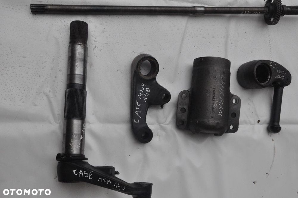 KOŁO TALERZOWE WAŁEK PÓŁOŚ NEW HOLLAND TM  CASE MXM 140 - 4