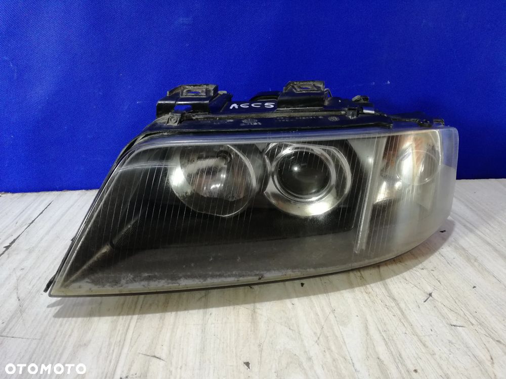 Audi A6 C5 Allroad Lift lampa reflektor lewa soczewka Europa 01/04 - 1